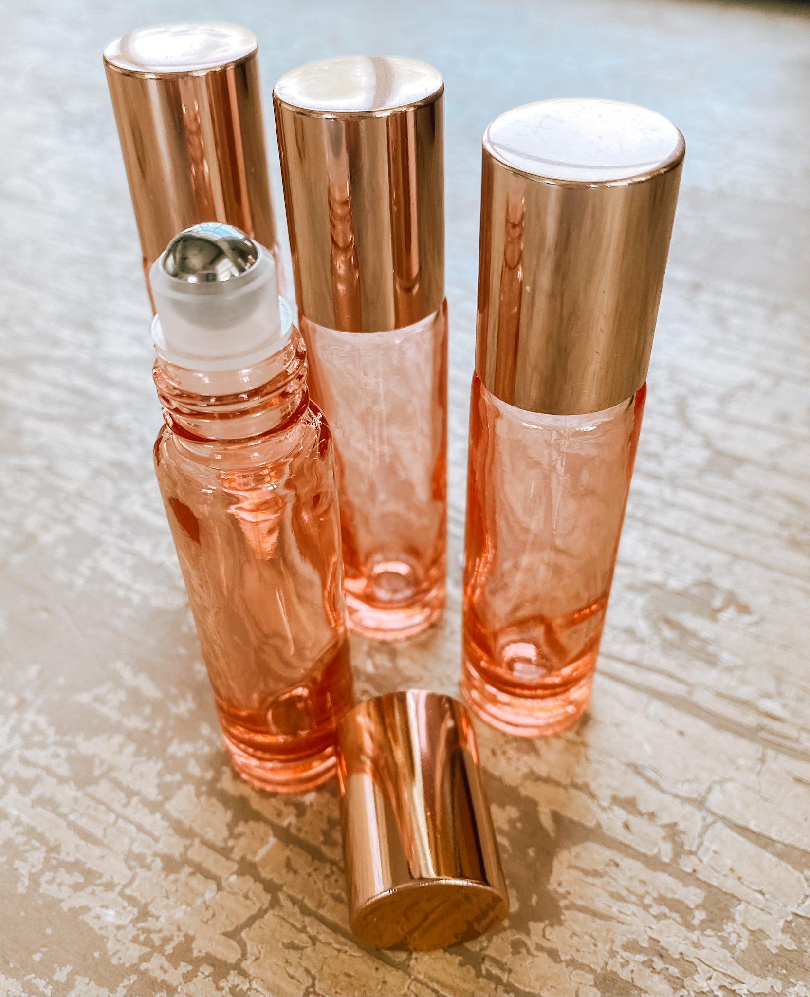 Rose Gold and Pink 10ml roller bottle